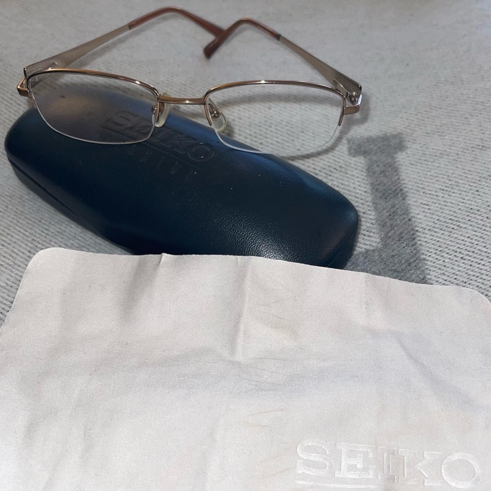 Like New Seiko Titanium rose gold semi-rimless J190 565 size 50-18-135.